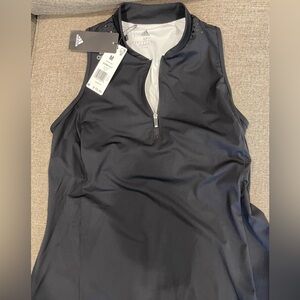 Adidas polo racer back golf shirt. Built in bra. Sleeveless
